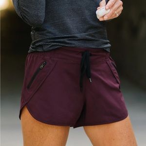 ZYIA • NWT Plum Fierce Zipper Pocket Shorts • Medium